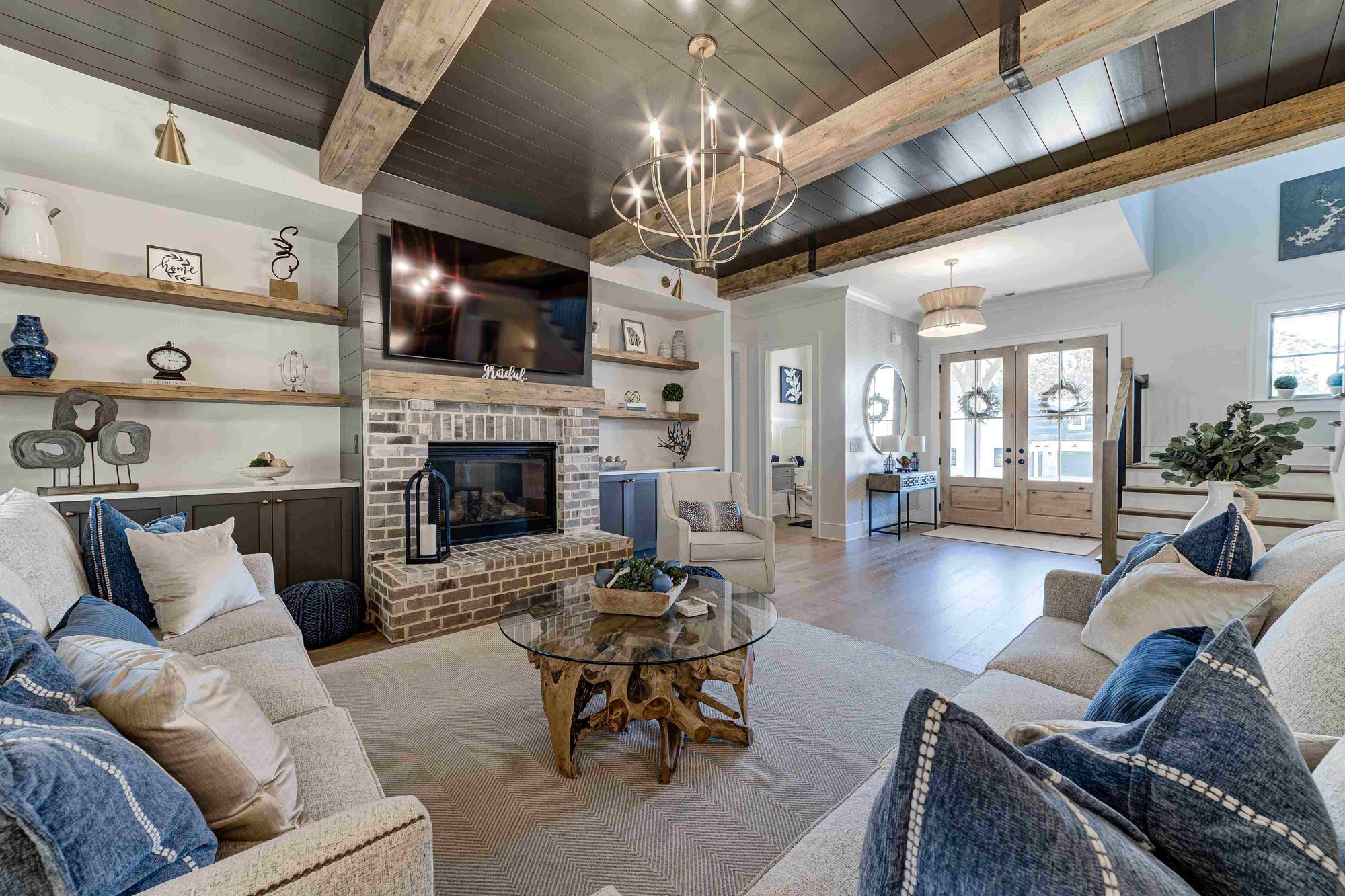 Custom Home Build Living Room Canton Georgia -  Should I Build a House in Atlanta Now or Wait - Elevation Building Company - North Metro Atlanta Builders with wooden features and fireplace
