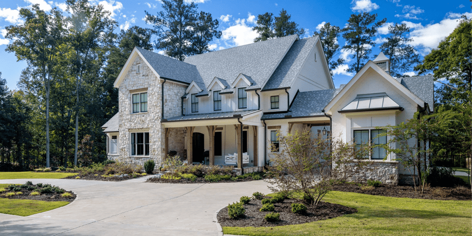 Custom Home with Stone Facade and Dormer Windows in Atlanta