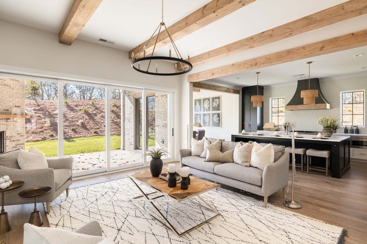 atlanta custom home modern living room with ceiling beams