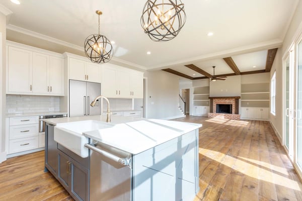 atlanta custom home kitchen with wood floors and light counters