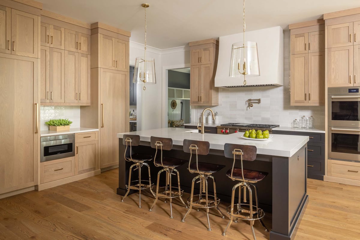 atlanta custom home modern kitchen with island and wood cabinetry