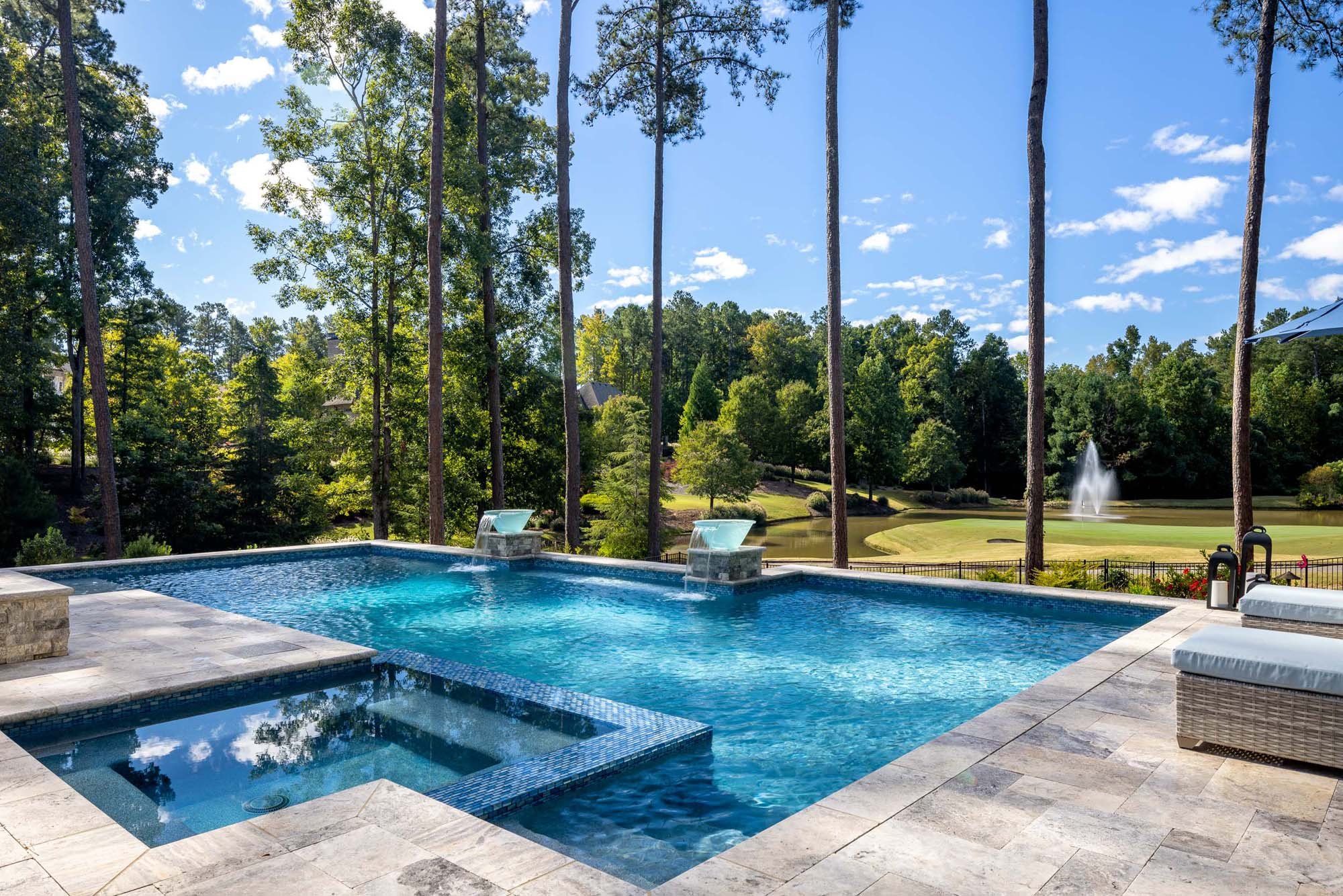 atlanta-custom-home-modern-exterior-outside-pool-Should I Build a House in Atlanta Now or Wait - Elevation Building Company - North Metro Atlanta Builders with luxury exterior features