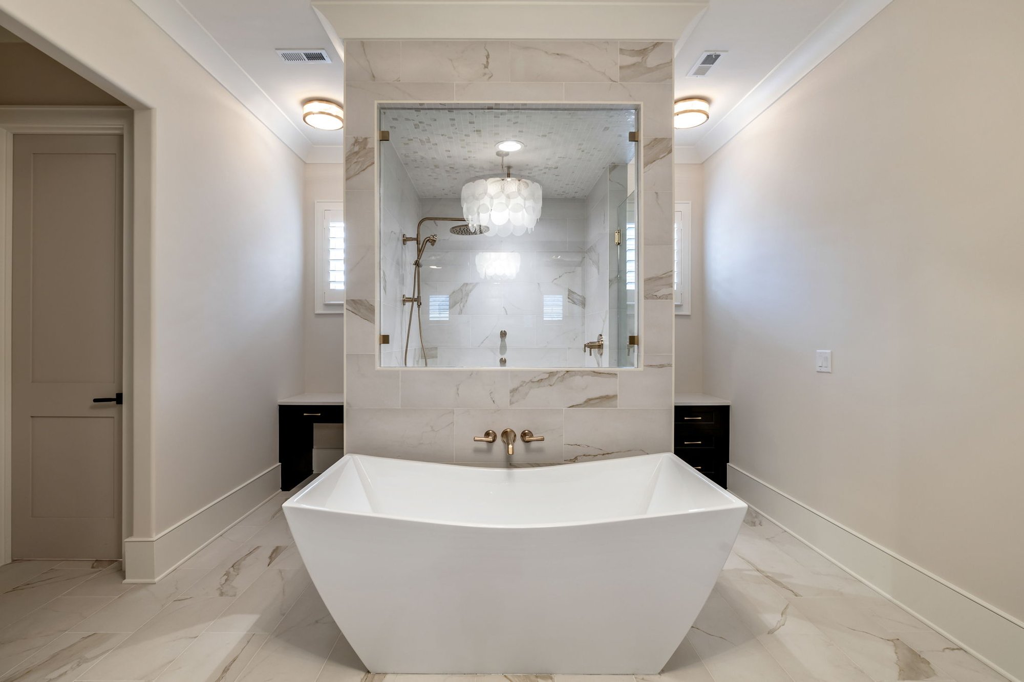 Luxury bathroom with bathtub glass-enclosed shower- Elevation Building Company - North Metro Atlanta Builders
