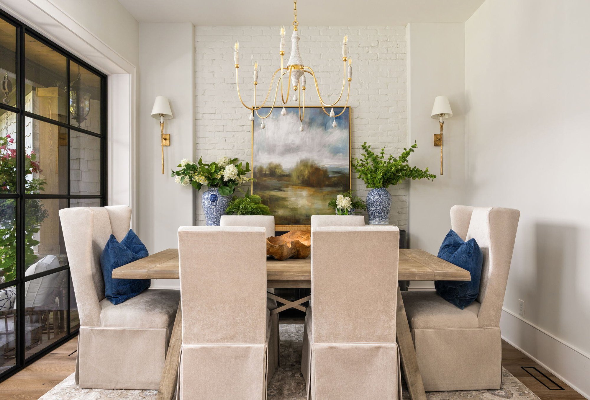Formal Dining Room with Chandelier and Large Storefront Windows in Atlanta Home Remodel -  The Ultimate Guide to Whole-Home Remodeling in Atlanta - Elevation Building Company - North Metro Atlanta Builders